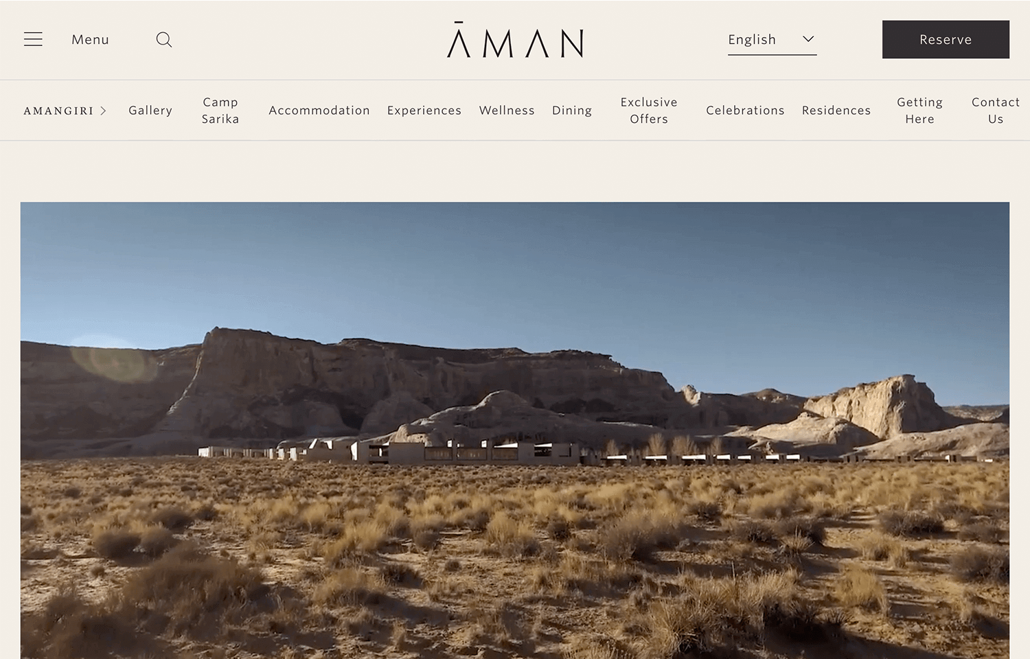 Minimalist hotel website design highlighting desert luxury resort.